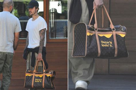 justin bieber louis vuitton|Justin Bieber Carries Cherished Dog, Oscar, in Louis Vuitton Dog .